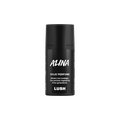 Alina. A short, cylindrical black push-up tube of the Alina solid perfume with a black label on the front covering the cap, with the product name and scent printed on it.