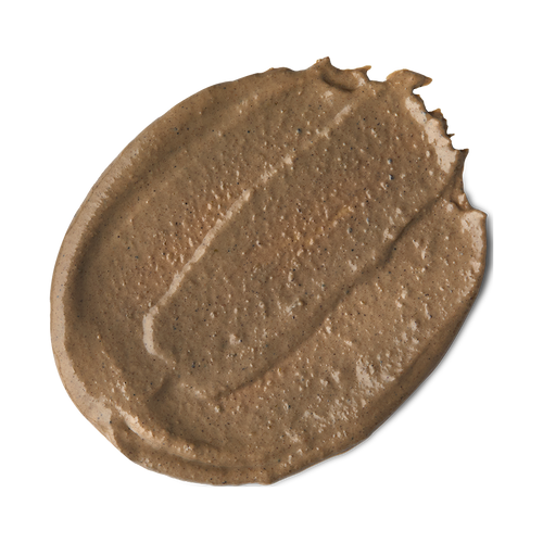 Ayesha. A round swatch of creamy, brown, visibly-textured face mask.